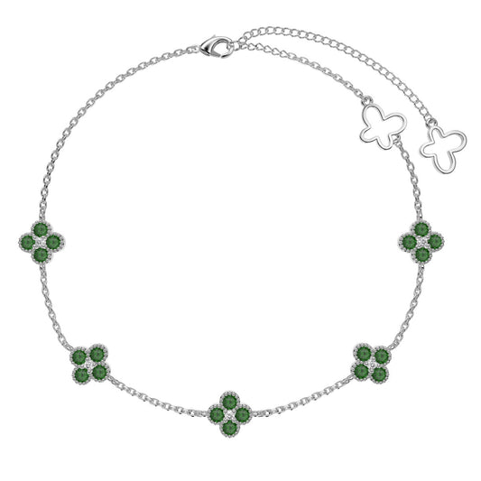 Silver anklet with green clovers